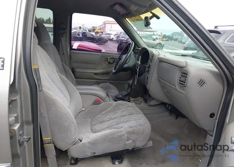 1999 GMC Jimmy Sle z USA, uszkodzony, nr VIN 1GKDT13W3X2543277